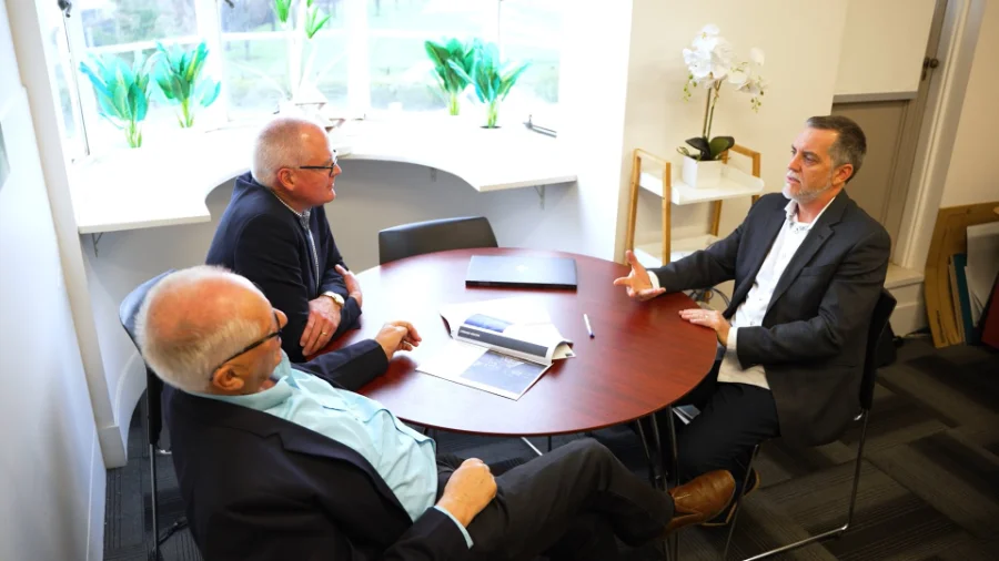 The Strategic team meeting a round table